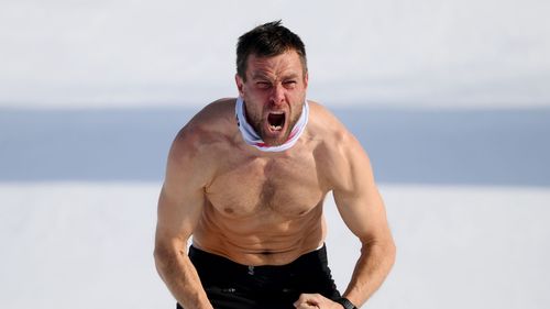 'Feeling superhuman!' - Karl rocks memorable shirtless celebration after taking snowboard gold