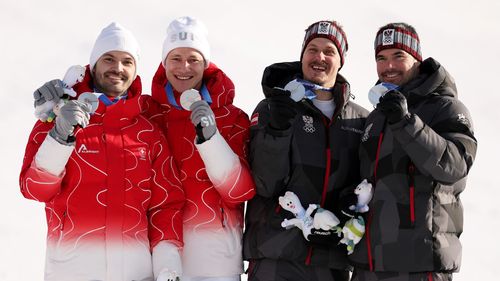 FOUR silver medals? Swiss and Austrian pairings share unusual moment