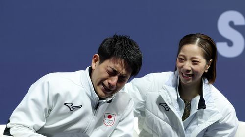 Miura sees the funny side as Kihara overcome with emotion 