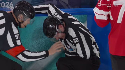 Linesman wounded by stray puck - 'Not the start he wanted!'