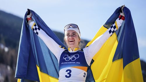 Andersson dominates to claim 50-km mass start cross-country gold