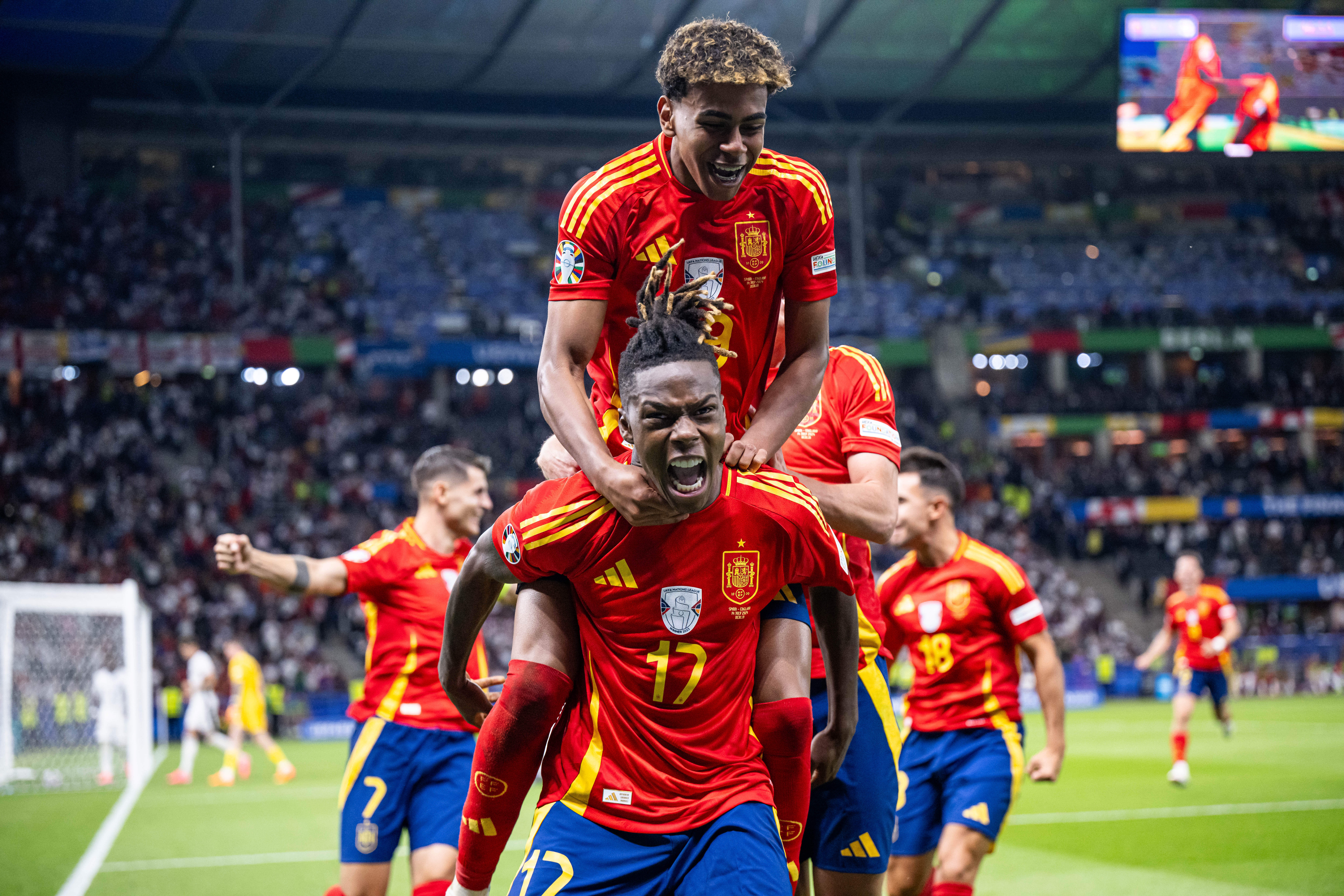 Lamine Yamal and Nico Williams celebrate scoring against England in the Euro 2024 final in Berlin