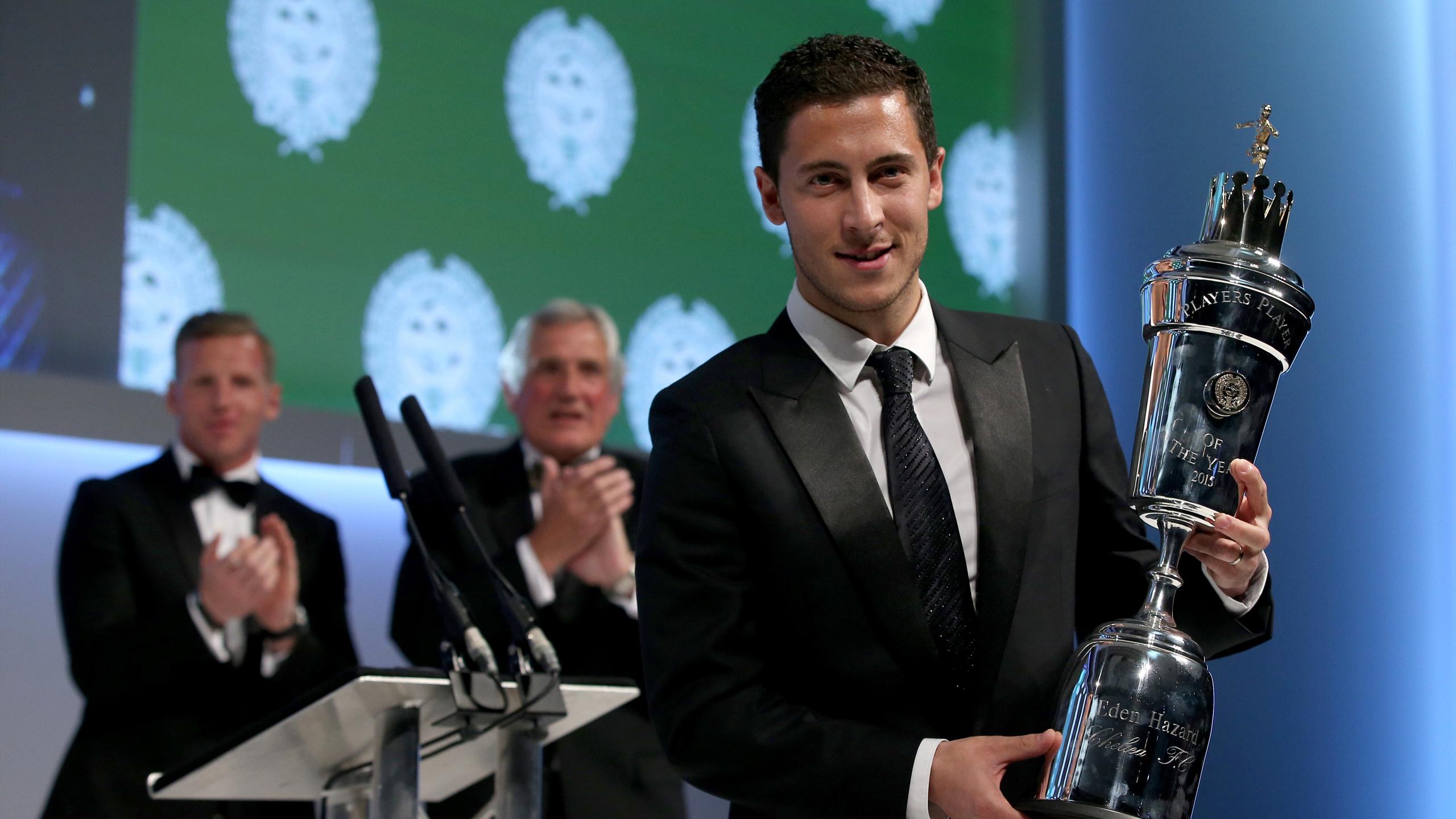 Chelsea's Eden Hazard receives his award for PFA's Men's Player of the Year Award 2015 during the PFA Player of the Year Awards 2015 at the Grosvenor House Hotel, London