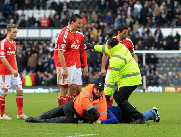 Derby fan is decked (PA Sport)