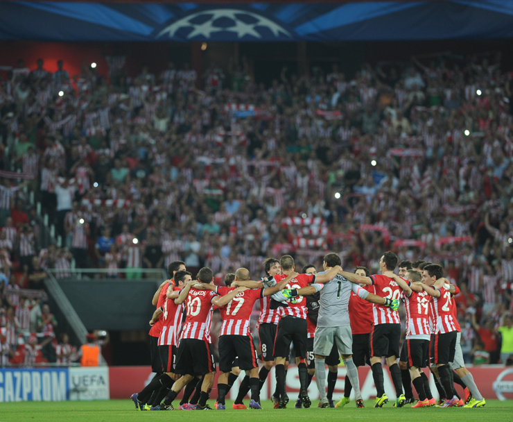 Athletic Bilbao players celebrate beating Napoli to reach the group stage