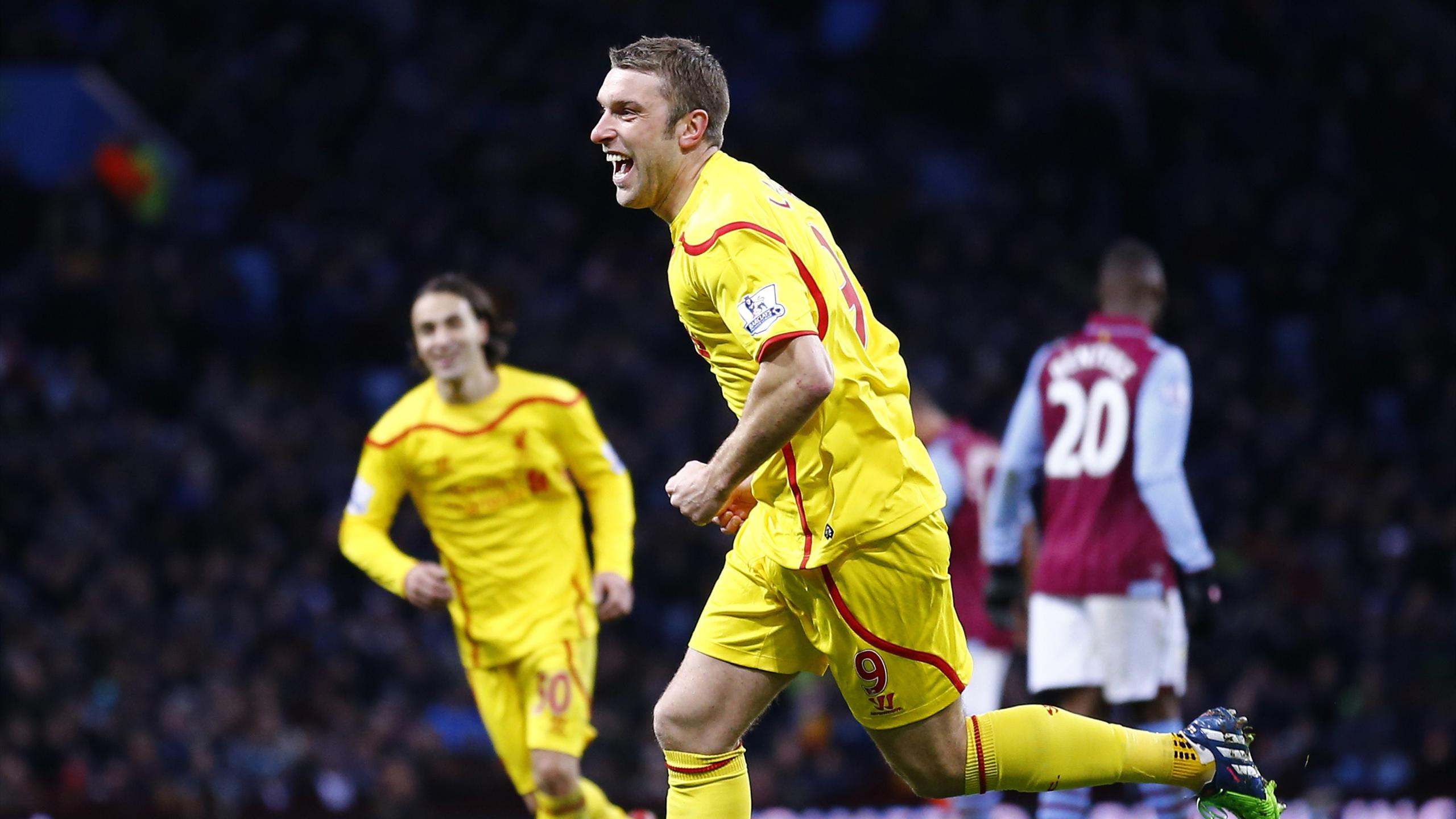 Rickie Lambert celebrates scoring for Liverpool against Aston Villa (Reuters)