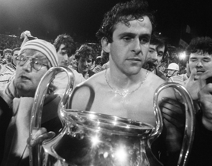 Michel Platini holds the European Cup after Juventus beat Liverpool at Heysel